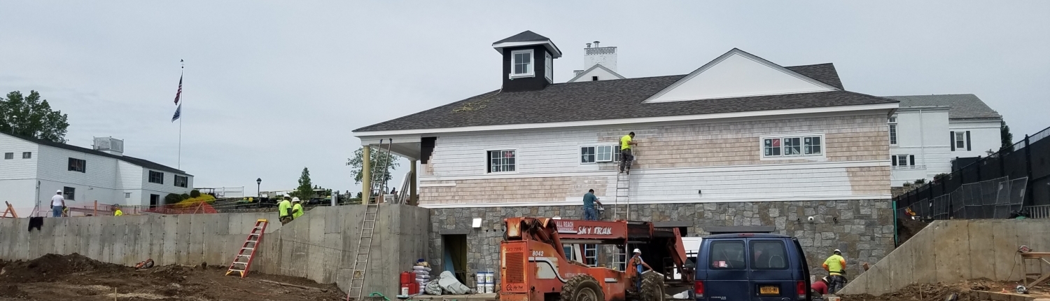 Building pictured with construction equipment and work being done