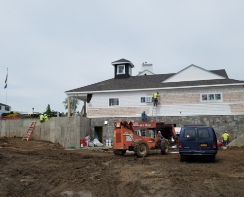 Building pictured with construction equipment and work being done