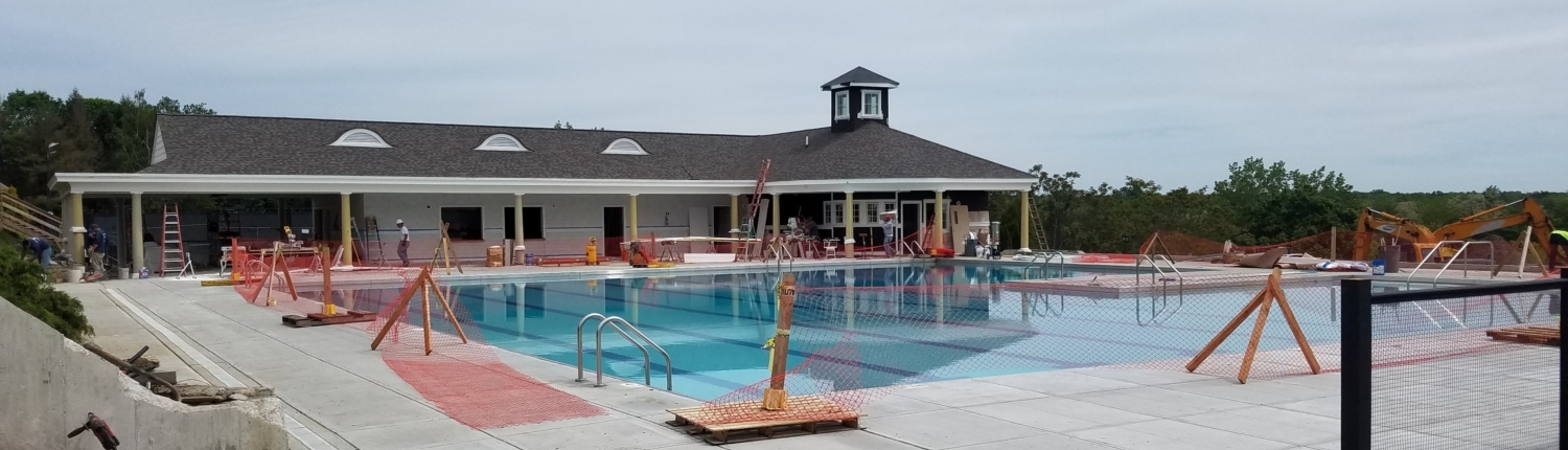 Angle from the pool deck looking across the pool toward the main structure