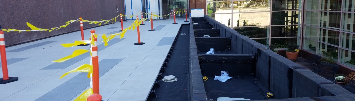 Installing the snow melt system on top of the pedestrian bridge