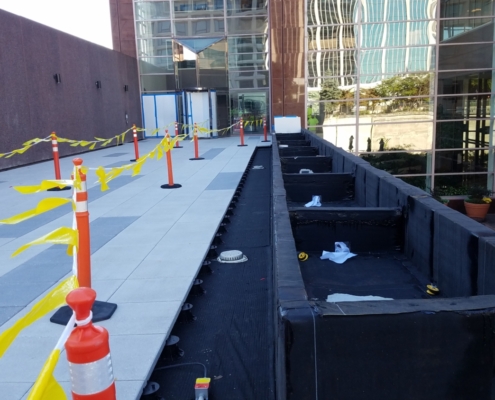 Installing the snow melt system on top of the pedestrian bridge