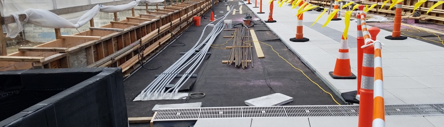 Installing the snow melt system on top of the pedestrian bridge