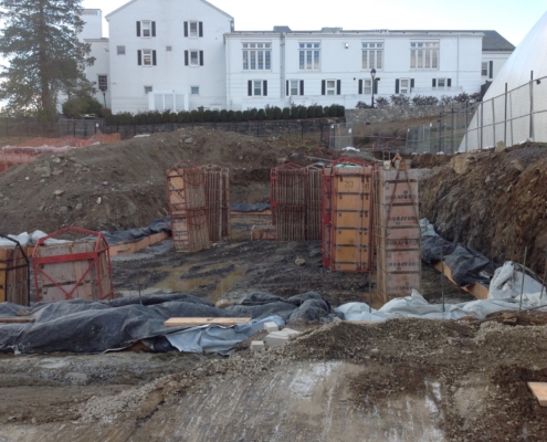 angle looking u at the building from a construction zone