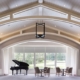 Clubhouse room with grand piano and seating area