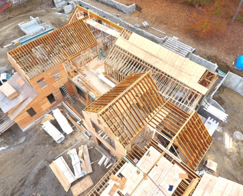 Construction photo showing the framing of the roof