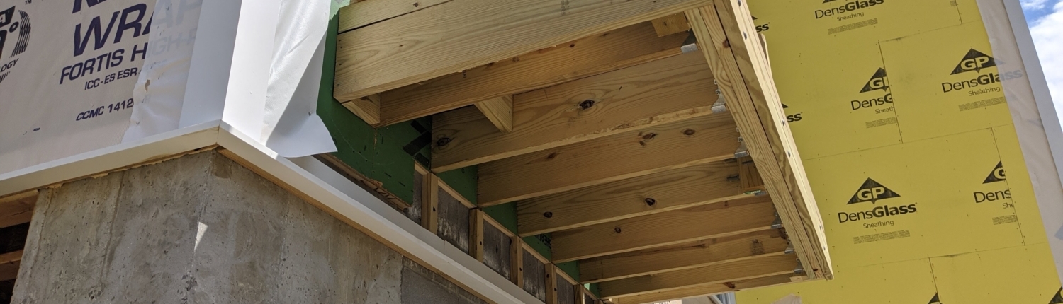 Balcony under construction on the side of a building