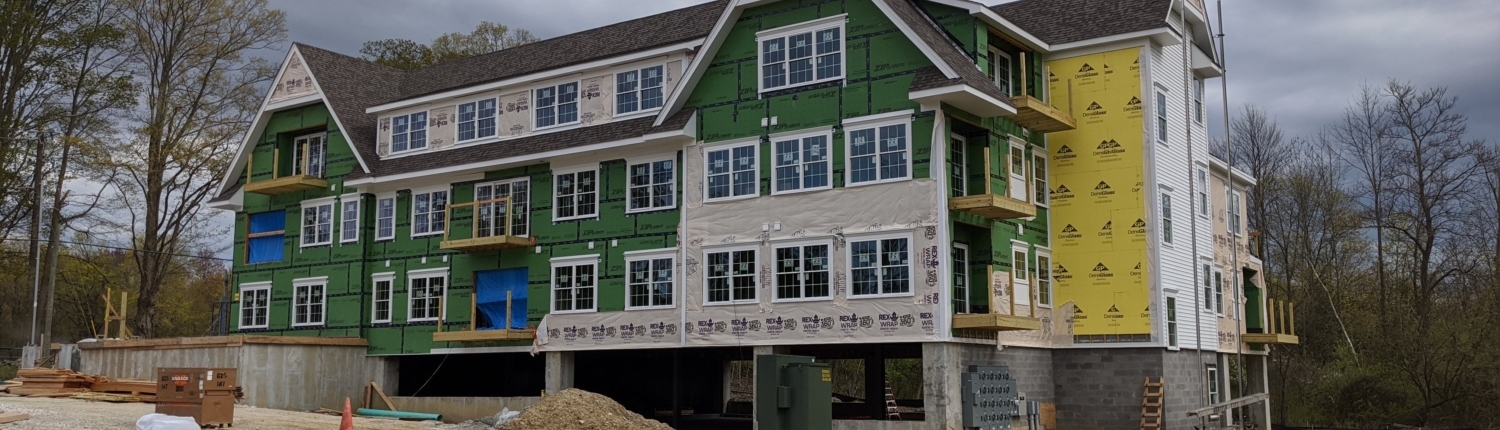 four story apartment under construction, prior to siding being added