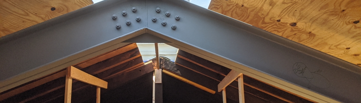 Steel I beam triangular roof framing