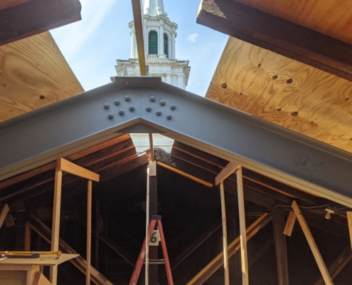 Steel I beam triangular roof framing