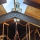 Steel I beam triangular roof framing
