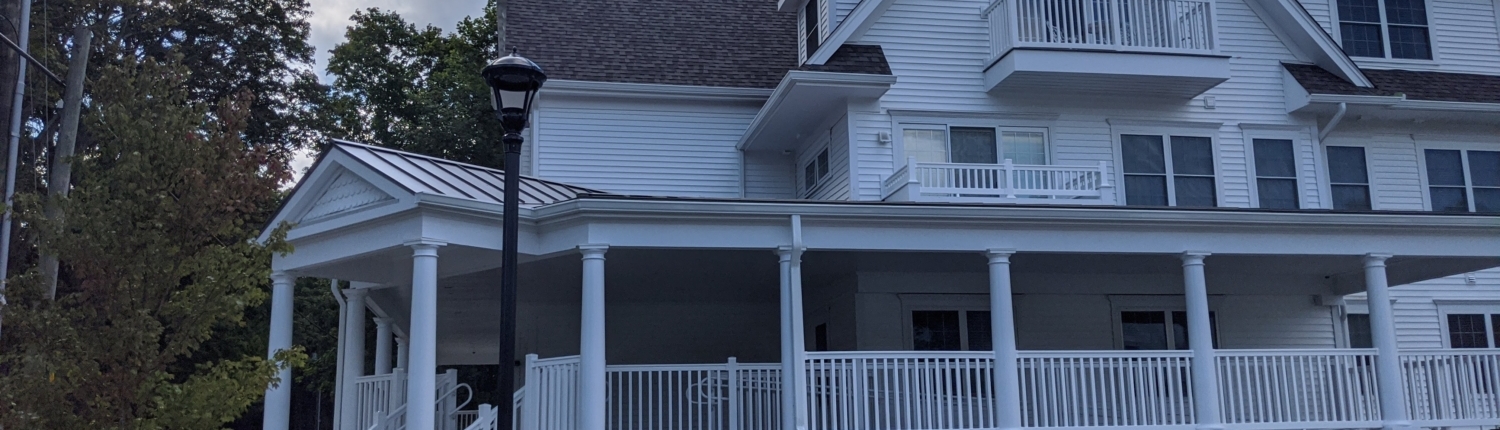 Apartment building with a covered porch